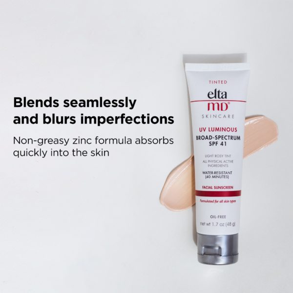 Large text “Blends seamlessly and blurs imperfections” and smaller text “non greasy zinc formula absorbs quickly into the skin” featuring EltaMD UV Luminous SPF 41 product tube over a smear of the tinted sunscreen