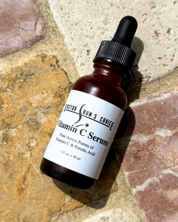 DSC vitamin c serum bottle lying against tile